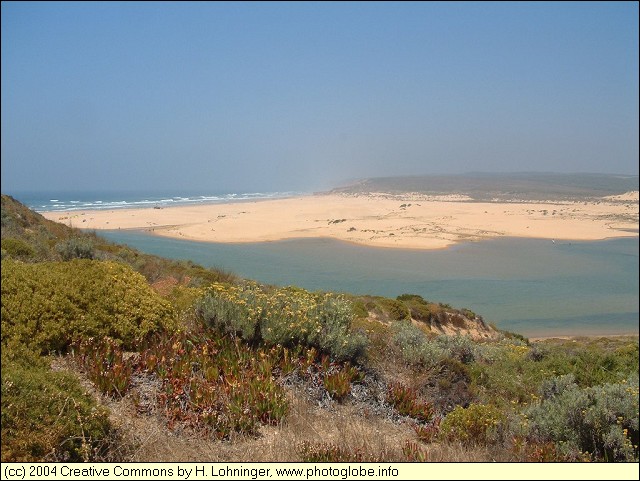 Small Lake with Praia da Bordeira in the Background